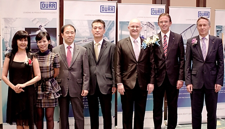 Dürr Thailand held their official opening ceremony on June 22 at the Grand Ballroom Shangri-La Hotel Bangkok. (Right to left) Dr. Hans Schumacher, President & CEO of Dürr Systems GmbH, Ralf W. Dieter, CEO of Dürr AG, Bernard Condrau, President & CEO of Dürr Thailand, Simon Oh, SEA Sales Director of Dürr Thailand, Tony Shin, Vice President of DÜRR Korea, Khanitta Khannongpho, Assistant to President & CEO DÜRR Thailand, and Sue K, PMTV Director.