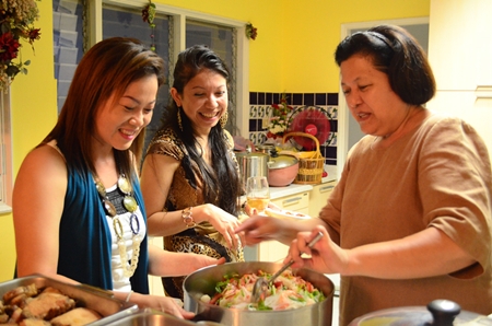 (L to R) Som, Pui and Alvi are having a great time preparing the Thai food.