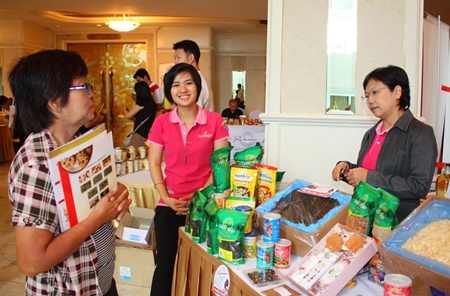 People at the seminar learn about various food products imported from the USA.