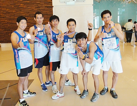 Staff and guests of the Holiday Inn Pattaya proudly show off their medals that they received for their participation in the Pattaya King’s Cup Marathon recently. The word is that they all completed the quarter marathon in record time.