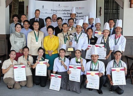 One of the highlights of the 6th Pattaya Food & Hoteliers Expo 2012 held at the Pattaya Exhibition and Convention Hall (PEACH) was the ‘Pattaya City Culinary Cup 2012’ international culinary competition, where 9 international and domestic culinary teams vigorously compete for the HRH Princess Maha Chakri Sirindhorn Trophy. The Royal Cliff Hotels Group won twelve medals including gold awards for F&B, Housekeeping and Spa plus the top prize in the Super Team Challenge 2012 “Gala Setting Supper team Challenge”. Royal Cliff Hotels Group’s Panga Vathanakul (MD), Vipavee Wuthichat (Resident Manager) Vitanart Vathanakul (Executive Director), Vathanai Vathanakul (Vice President), Praweena Jetthumrong (Executive Housekeeper) Christoph Voegeli (GM) Walter Thenisch (Executive Chef), and Horst Rautert (Pastry Chef) pose with their award winning team.