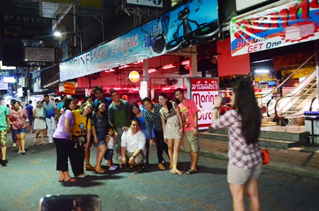 Visitors still wander through Walking Street even though all bars and entertainment venues are closed on Khao Pansaa.