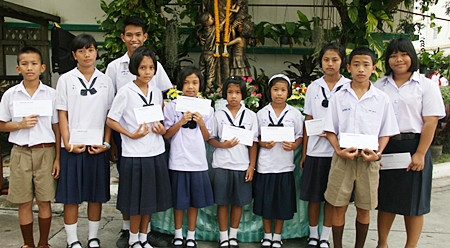 Ten local children received scholarships.
