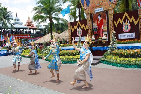 Professional dancers perform Thai classical dance during the celebration.