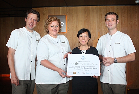 (From left) Hilton Hotel Pattaya’s Michel Scheffers (Director of Operations), Peta Ruiter (Director of Business Development) and Food and Beverage Manager Simon Bender (right), present the prize to Radchada Chomjinda (2nd right), head of the Human Help Network Thailand. 