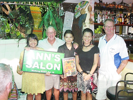 Tuesday’s winners pose with Ann from Ann’s Salon and the staff of The Relax Bar. 