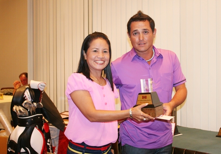 Ladies winner Janthorn Kuanha receives her trophy.