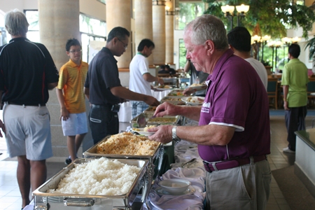 Players get stuck into the delicious buffet.