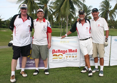 The Pattaya Mail team pose for a photo.