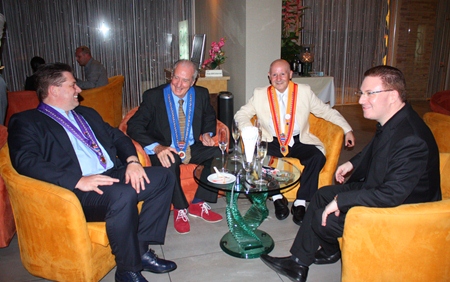 (L to R) Alfred Madl, Dr. Iain Corness, Guido Vietri and Ben Abrahams have a friendly conversation over some white wine.