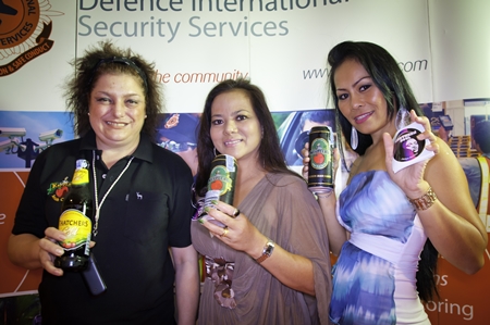 Selina Lazzarini, left, shows off her popular cider, with Onuma Willmore and Jom Arisa Ch.