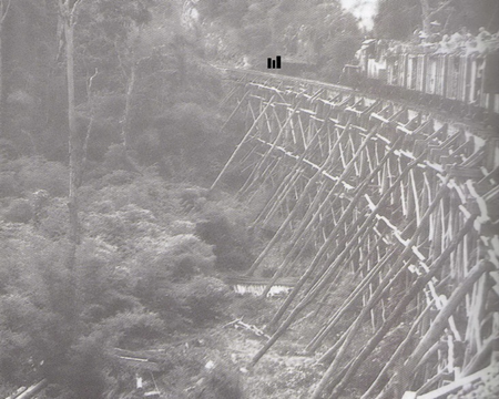 Three-Tier Trestle with train heading toward Hin Tok Cutting. The black rectangles represent where the backs of the three members of the Young Marines would have been located.