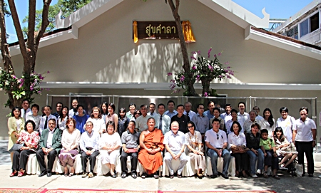 Benefactors and friends gather for a group picture during the opening ceremony.