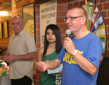 Spinning the wheel for the lucky draw prizes.