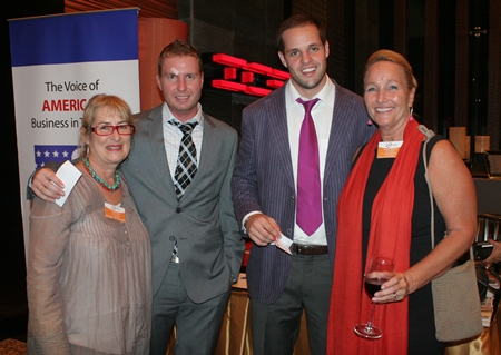 (L to R) Bronwyn Carey, Paul Stoddost, Joe Peotto, and Rosanne Diamente (Women with a Mission) discuss the upcoming charity golf tournament.