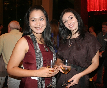 Karnsinee Lertrattanasan and Irena De Ribas brighten the night with their smiles.