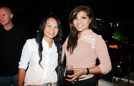 Smiling property consultants Piyanuch Puangkhamnuan (left) and Prapai Sema (right) from Enjoys Property Co., Ltd.