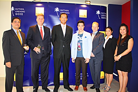 Democrat Party Deputy Leader Korn Chatikavanij (3rd left) recently presided over the official opening of the new offices of Savills Co. Ltd. The real estate management company is located on North Pattaya Road. Attending the ceremonies were Robert Collins (3rd right), CEO Savills Thailand; Chris Marriott (2nd left), CEO Savills South East Asia and Prem Bussralhamwong (centre).