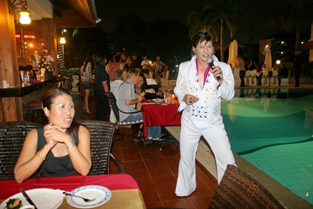 Elvis Presley is ‘all shook up’ as he excites the audience into a frenzy.