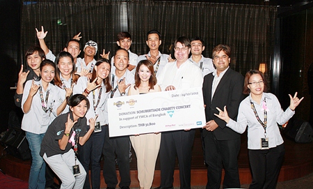 It was a time for celebrations as a huge cheque amounting to 32,800 baht was presented to Praichit Jetpai (centre), Chairwoman of the Y.W.C.A. Bangkok Pattaya Center. The funds were raised at the Schubertiade Charity Concert held at the Hard Rock Hotel recently. The event was hosted by Hard Rock Hotel Pattaya together with Pattaya Mail Media Group, New Frontier Music Academy and BBX. On hand to make the presentation were Patrick Ng, Executive Assistant Manager of Hard Rock Hotel Pattaya, Tony Malhotra (2nd right), Assistant Managing Director of Pattaya Mail Media Group, and Laurie Muir (3rd right), International Business Development Manager of BBX.