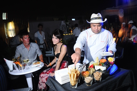 Delicious food is prepared on the rooftop by chef de cuisine Parthomrat Rakkanam.