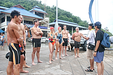 Pattaya sea-rescue officers explain markers and routes before the long distance swim.