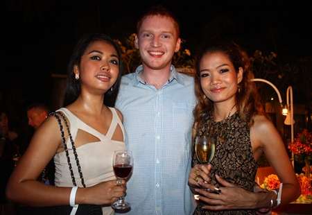 (L to R) Chanida Pornpipat, Sales Executive, Lawrence Knowles, Sales Manager, both with Compass Real Estate; and Chompoonuch Thanaphisutjinda.