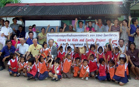 Rotarians from Japan, Australia, USA and Thailand hand over a library during this ceremony.