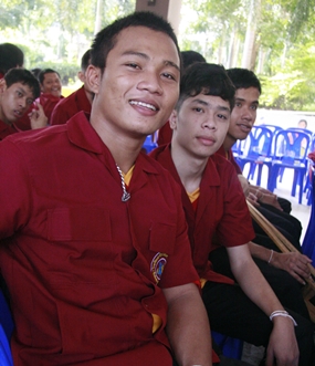 Mos, left, on his first day at vocational school.