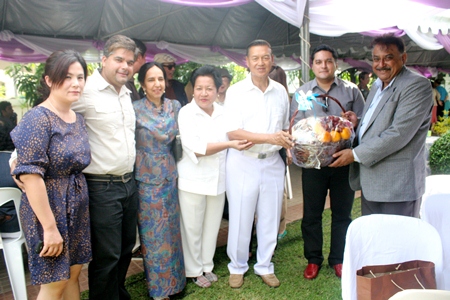 The Malhotra family pays respects to their guide and mentor.