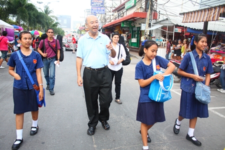 Mr Condom himself, Mechai Viravaidya marches in the parade with students from his new Mechai Pattana School & Kelly Lifelong Learning Center at the Birds & Bees Resort in Pattaya. <http://mechaifoundation.org/school_birdsbees.asp>
