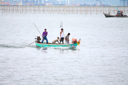 Fishermen return from the sea.