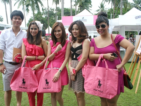 Getting into the spirit of things on Pink Polo Day.