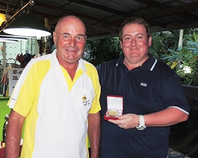 Mark McDonald (right) collects his third low gross medal (Aug, Sept & Nov) from Capt’ Steve. 