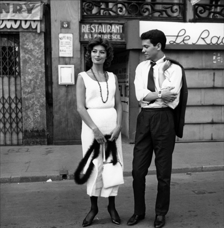 Anouk Aimée (left) and Marc Michel are shown in a scene from the 1962 romantic drama “Lola”.