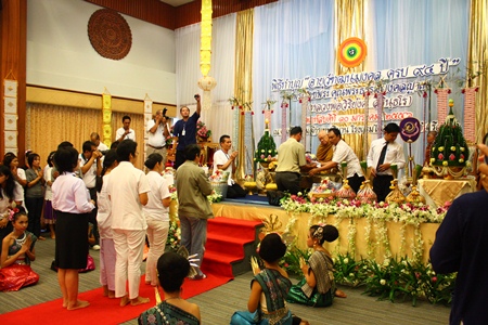 Devotees line up to make their offerings.