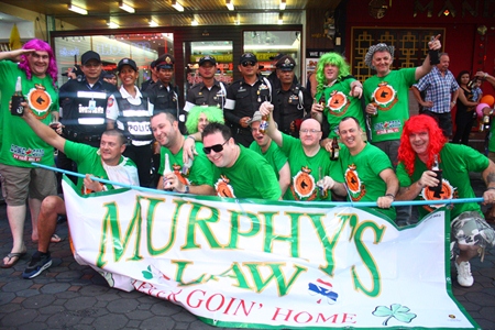 Murphy’s Law poses with the Thappraya volunteers at the end of the race after the latter worked to ensure the safety of all the contestants and spectators.