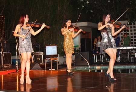 Violinists perform a live concerto as part of the gala countdown activities at Holiday Inn Pattaya.
