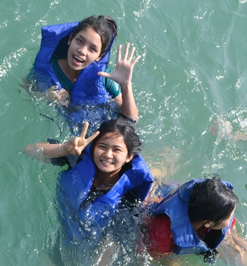 The usually shy girls enjoyed a day in the water.