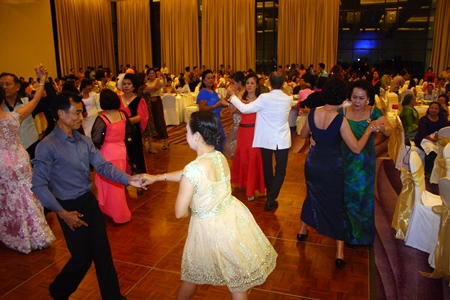 Guests take to the dance floor during the Red Cross fundraiser at the Zign Hotel, Pattaya.