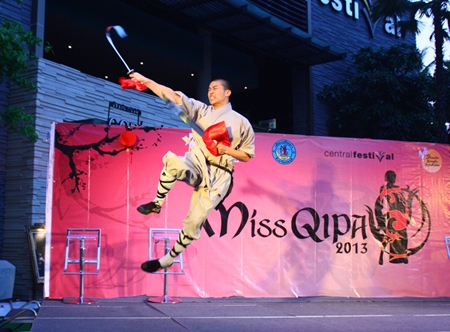A martial arts student from Shaolin Kung Fu Syndicate flies through the air during his demonstration.