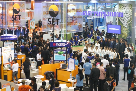 Many people crowd into PEACH conference hall for the opening day of the 3rd Money Expo Pattaya 2013.