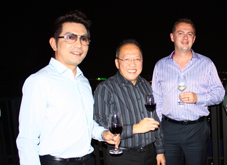 (L to R) Prayuth Thamdhum (GM Montien Pattaya) enjoys a rooftop drink with Chatchawal Supachayanont and Garth Solly (GM Holiday Inn Pattaya).