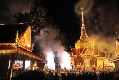 Fireworks and smoke surround the crematorium site where Cambodia’s former King Norodom Sihanouk rests, in Phnom Penh. (AP Photo/Wong Maye-E)