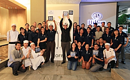 Hilton Pattaya GM Philippe Kronberg (centre right) and his staff marked Earth Hour 2013 from 8:30 p.m. to 9:30 p.m. local time on Saturday, March 23, 2013. Together with 3,900 hotels within the Hilton Worldwide portfolio of brands, citizens and organizations around the world, lights were turned off in support of action on global climate change.