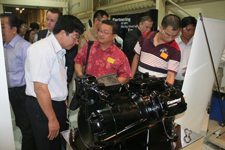 Customers examine the Copeland compressor technology.