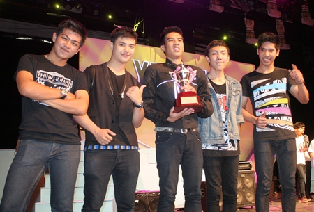 Winning teen band, Loney Park, is excited to receive their trophy.