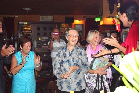 Surprise!  Around 80 of Sister Joan’s friends and well-wishers hid in Jameson’s Irish Pub to surprise her on her 80th birthday.