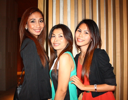 (L to R) Krittiya Thongkamdee, Executive Manager of Beli Slon Real Estate, poses with Suchada Wongin and Kanjana Phummanao from Vehicle Spot Showroom.