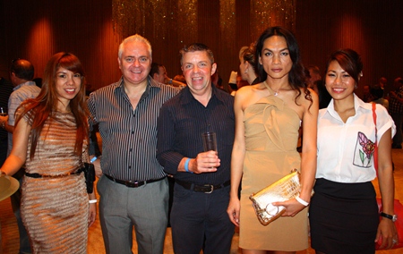 (L to R) Nitjaree Jaemsawang from Clare Pattaya Property Co., Ltd.; David Strachan, Consultant with PFS International; Paul Strachan, Yanisa Srisuk from Clare Pattaya Property Co., Ltd and Sudaporn Changthong, Director of Infinity Magazine line up for a photo op.